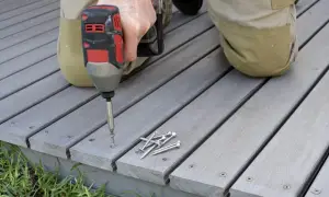 Impact Driver drilling into composite decking